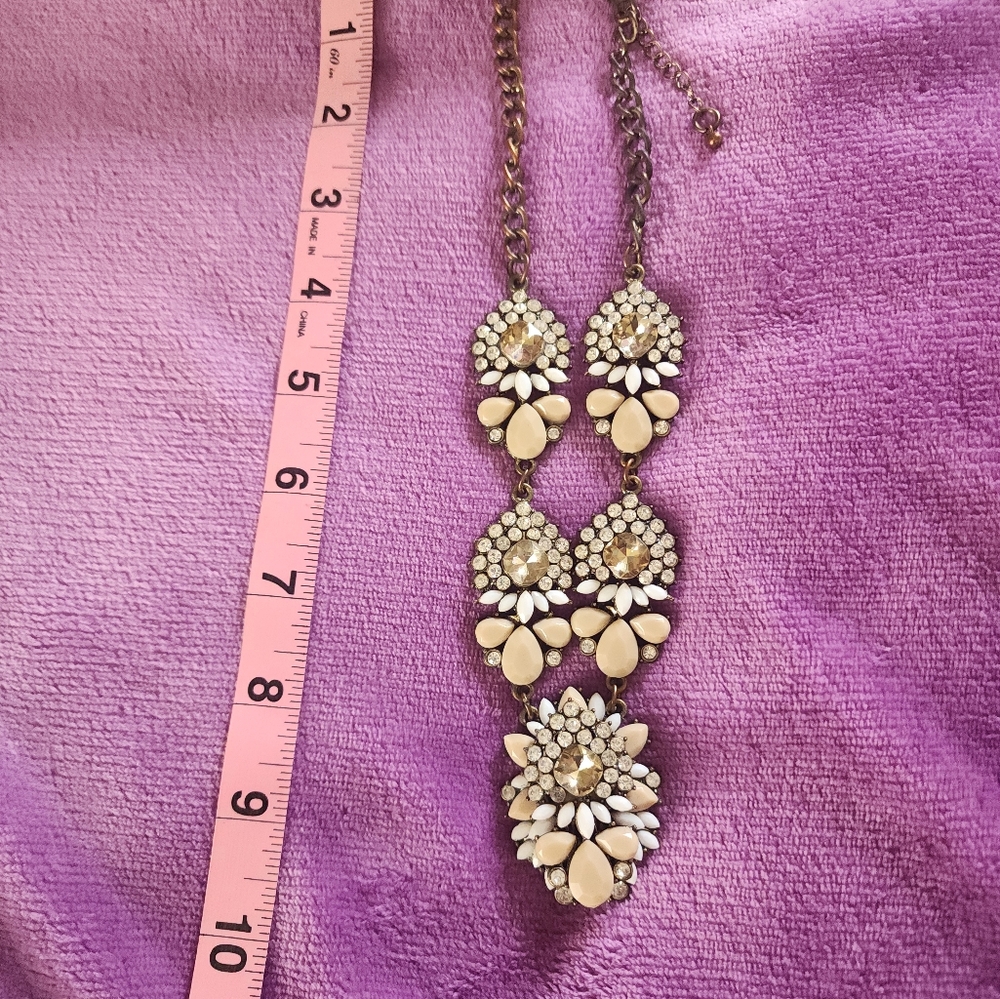 Elegant Gold and Cream Statement Necklace With Tank Top